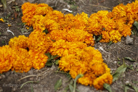 Cross made of marigolds