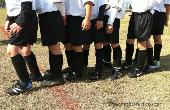 kids wearing soccer shoes and uniform