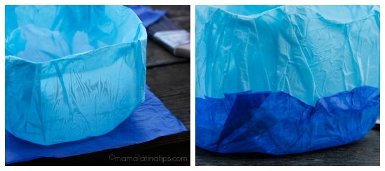 Adding layers of blue tissue to a milk jug - mamalatinatips.com