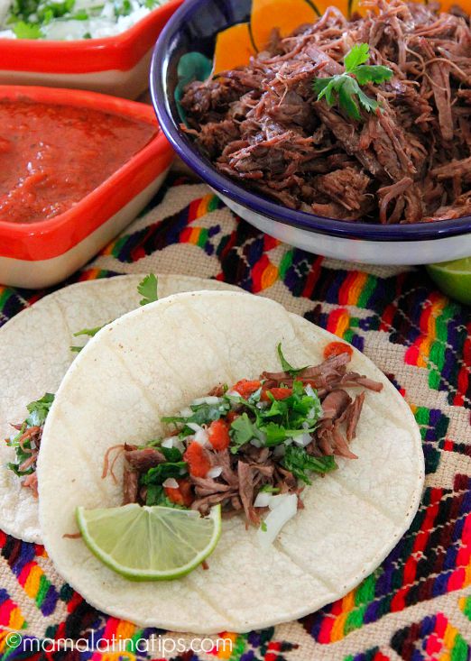 Beef barbacoa taco with lime