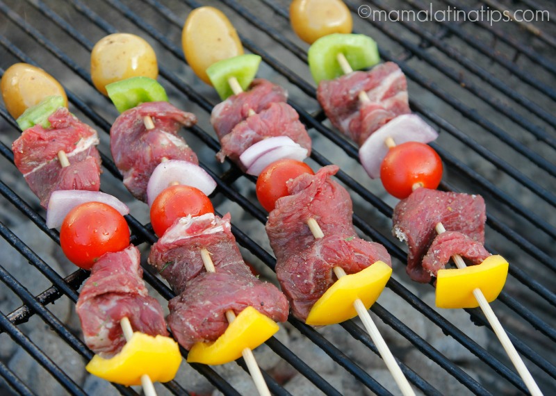 Angus Beef Kabobs with cherry tomatoes, peppers and potatoes on the grill
