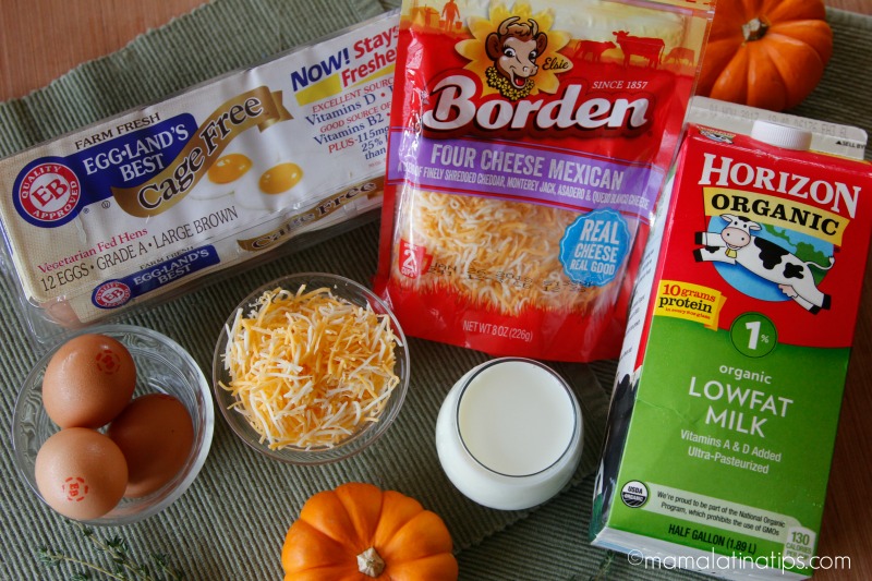 ingredients to make muffins, a carton of egg-land's best eggs, Borden cheese and a carton of Horizon organic low fat milk 
