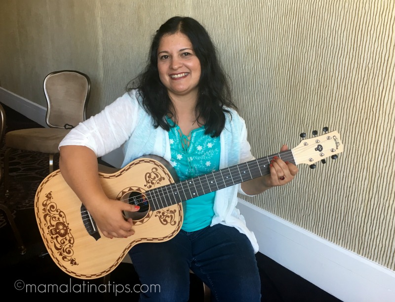 Silvia playing with a replica of Coco's guitar