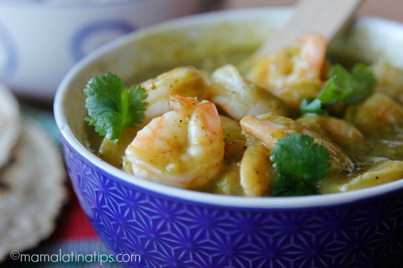 shrimp in roasted green sauce in a blue bowl