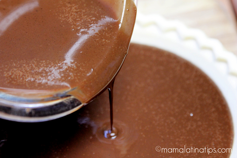 Pouring chocolate pie mixture into pay shell