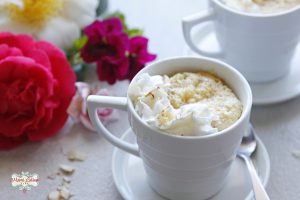 Amaretto mug cake with whipped cream