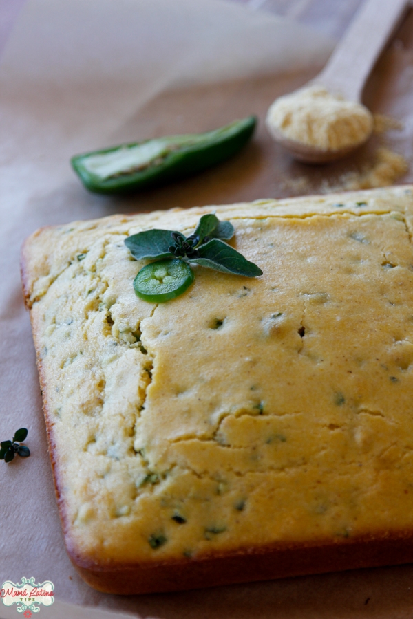 Herbed jalapeño cornbread with fresh oregano on top