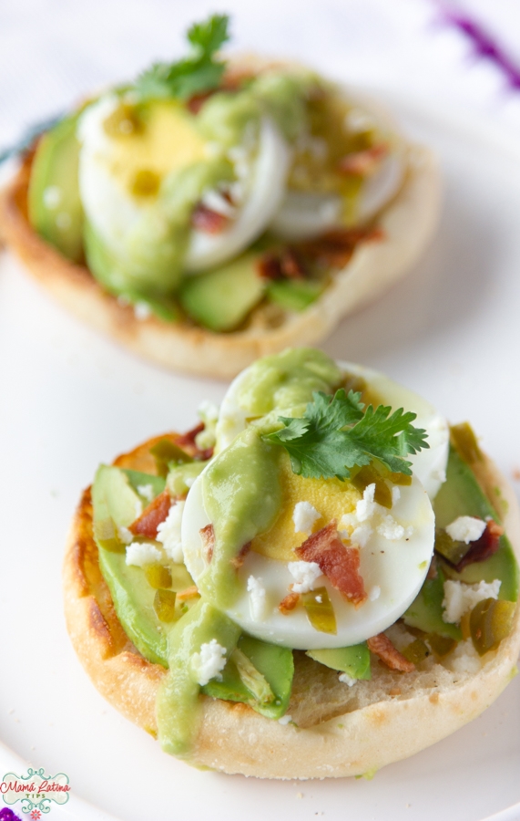 Two Two Hard-Boiled Egg Avocado English Muffins with bacon bits on top