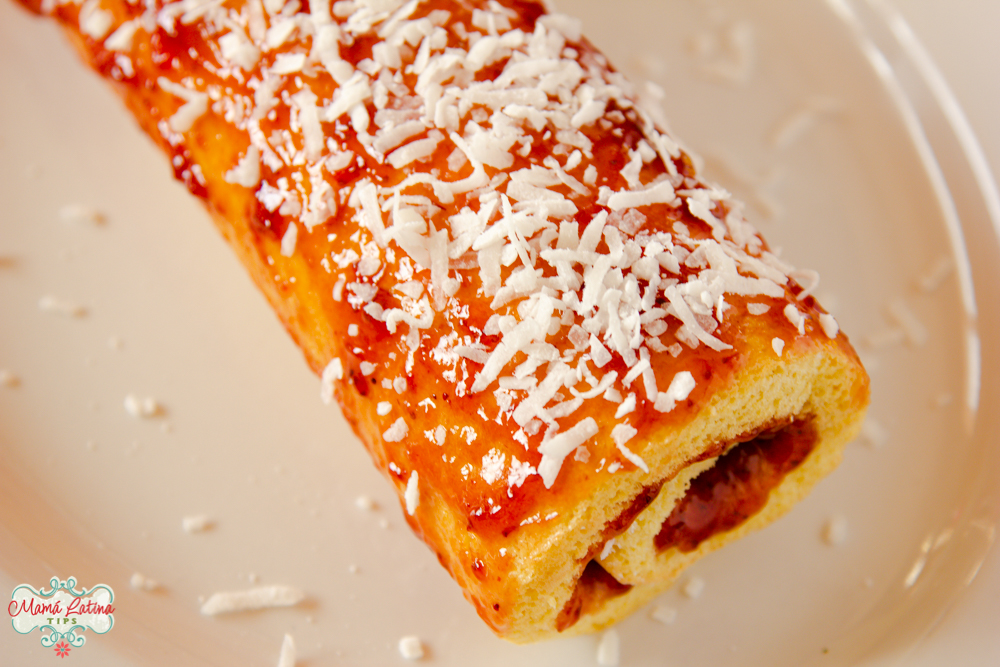 Mexican jelly roll with strawberry jam and coconut