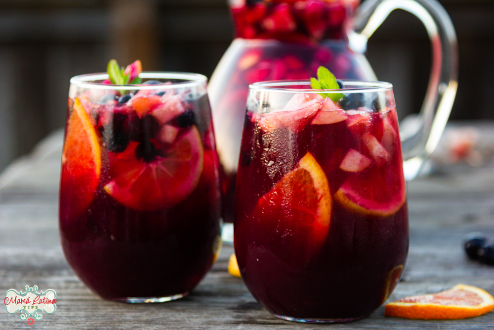 pomegranate-blueberry sangría mocktail in two glasses