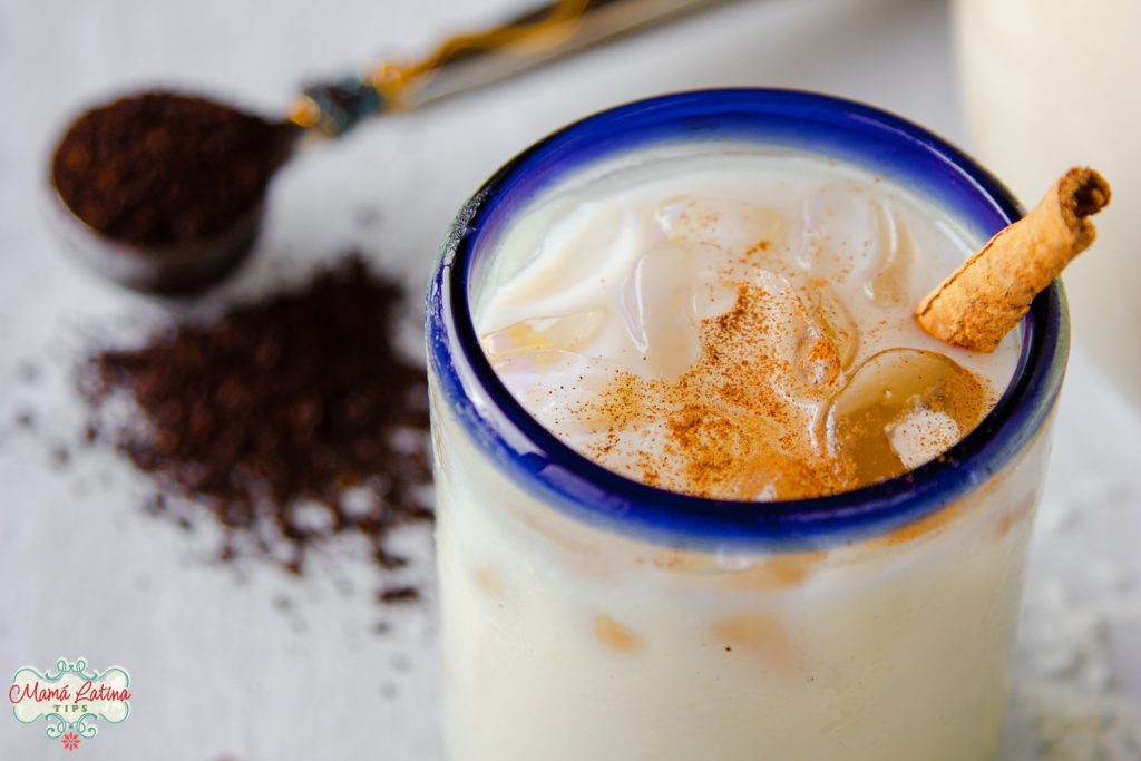 Mexican coffee horchata agua fresca on a glass with ice and cinnamon