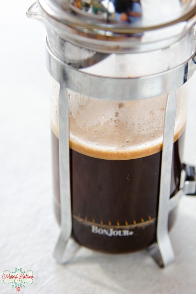 A french press with coffee