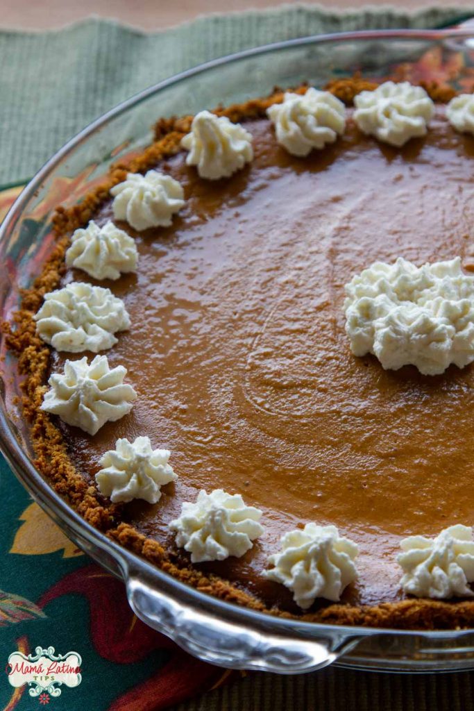 Pumpkin pie with whipped cream rossetes