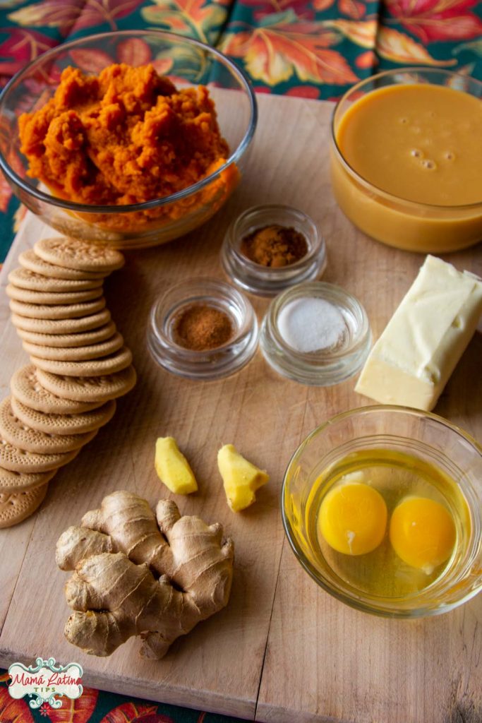 Maria crackers, ginger, butter, eggs, spices on a wooden table