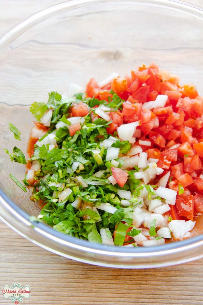 chopped onion, cilantro, peppers and tomatoes