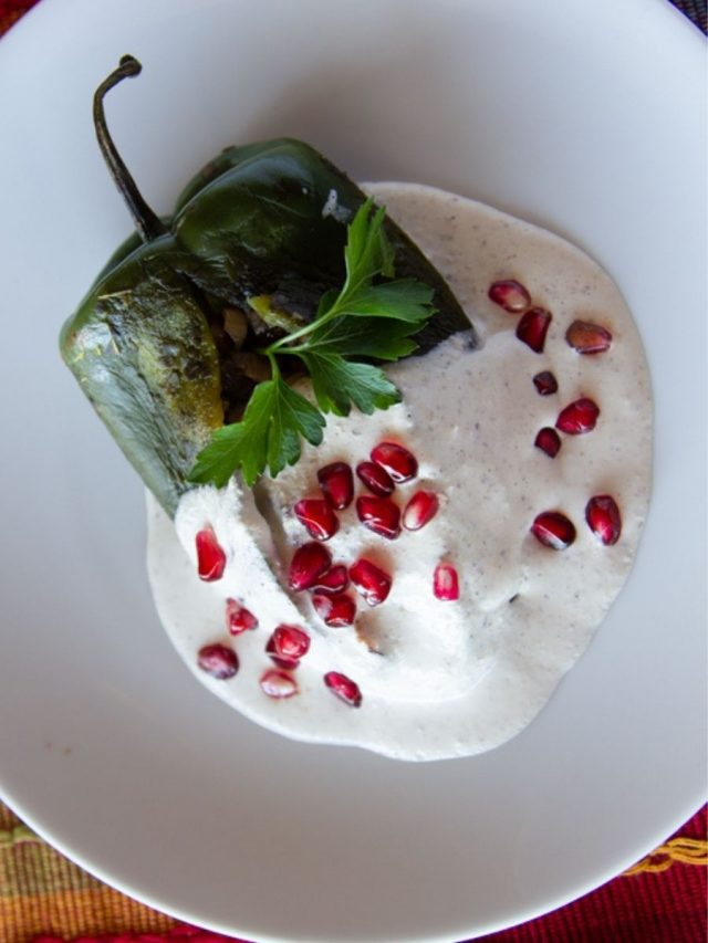 Stuffed Poblano Peppers in Walnut Sauce (Chiles en Nogada)