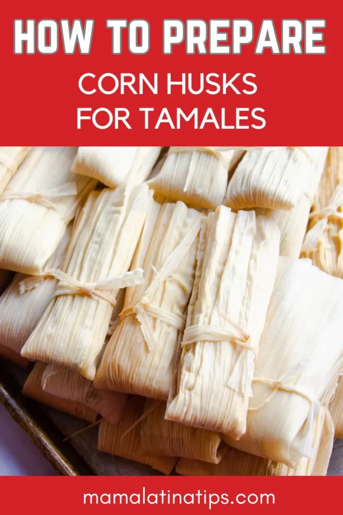 A tray of corn husks wrapped around tamales, tied with strips of husk, with text reading "How to Prepare Corn Husks for Tamales: A Step-by-Step Guide.